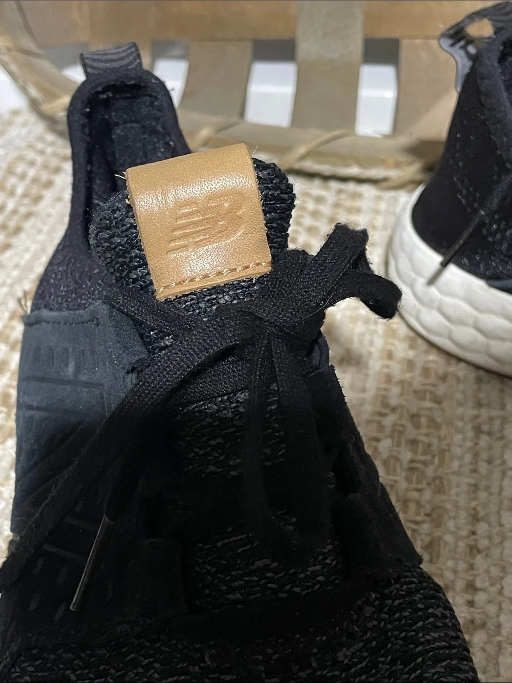 New Balance Black and White Athletic Sneakers with Tan Pull Tab